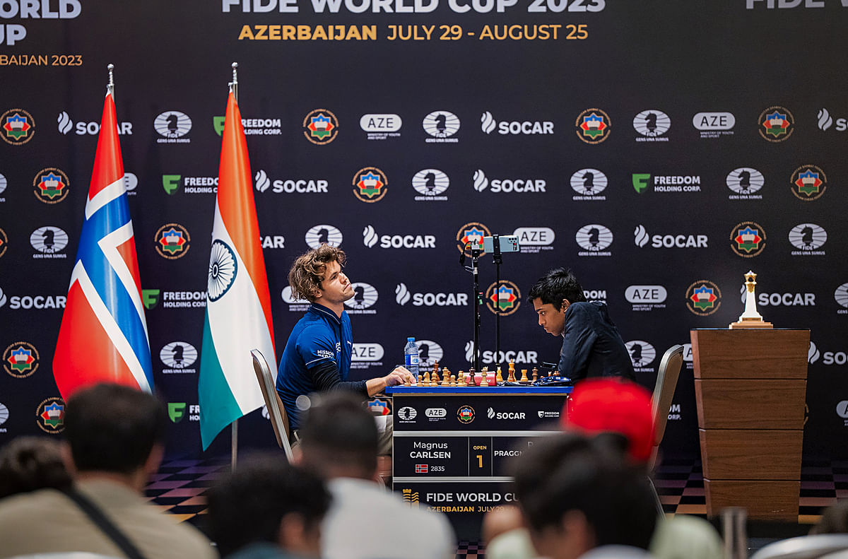  Indian Grandmaster R Praggnanandhaa and Norway's Grandmaster and World No. 1 player Magnus Carlsen during their second match of the Chess World Cup 2023 final, in Baku, Wednesday, Aug 23, 2023.
