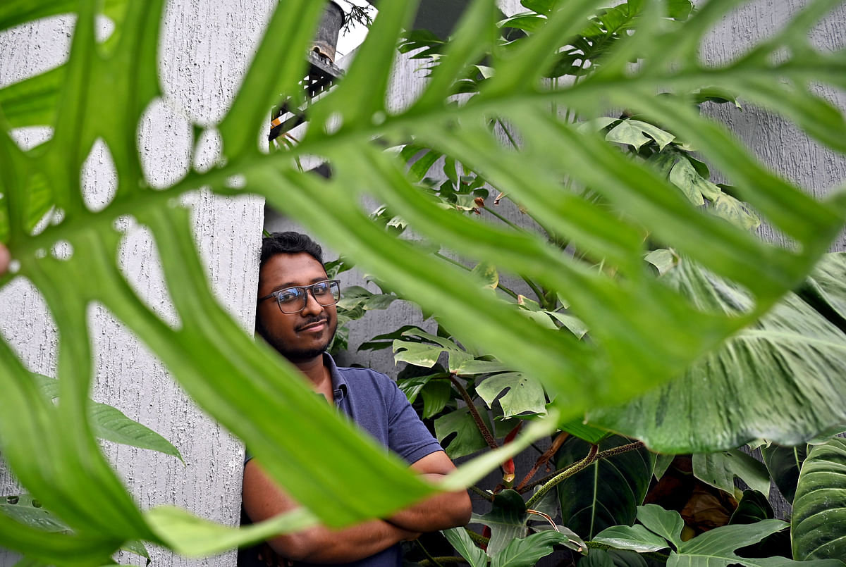 Navneeth Kumar a plant consultant at his greenhouse. Photo by Pushkar V