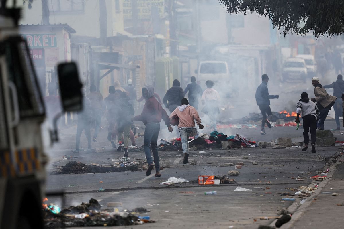 Protesters in Masiphumelele clash with Cape Town's law enforcement amidst an ongoing strike by taxi operators against traffic authorities in Masiphumelele, Cape Town, South Africa, August 8, 2023.