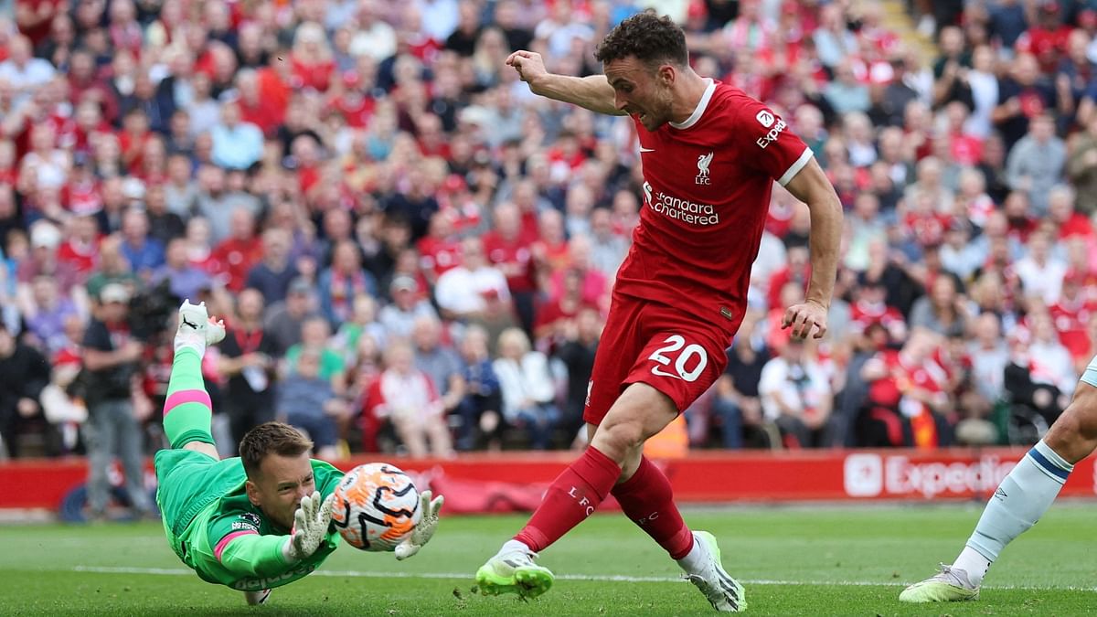 10-man Liverpool come back from behind to beat Bournemouth 3-1