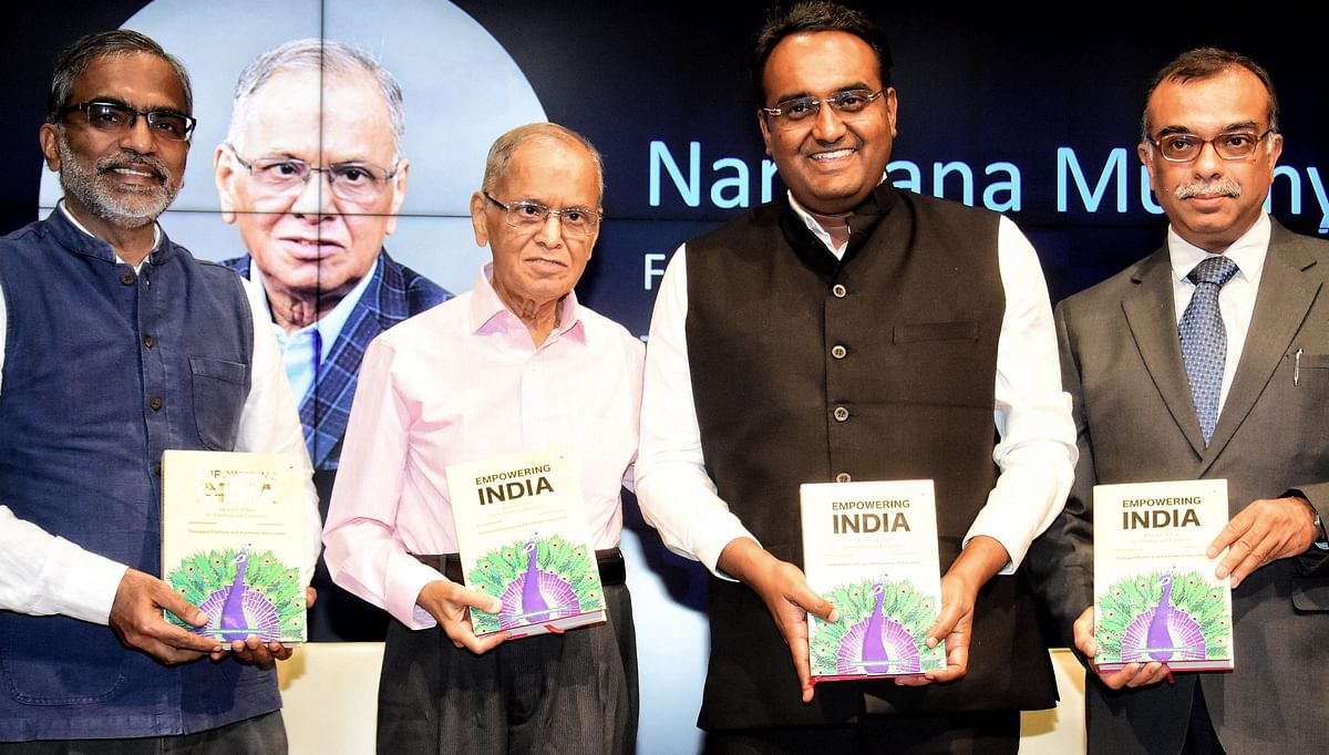 (From left) IIT Madras Prof T Pradeep Infosys founder Narayana Murthy Itihaasa Research and Digital president Krishnan Narayanan and Indian Academy President Prof Umesh Waghmare during the book launch in Bengaluru on Sunday. PTI 