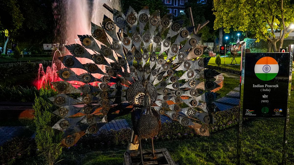 India's national bird peacock sculpture, made from scrap metal, installed in preparations for the G20 Summit, at G20 Park, Chanakyapuri.