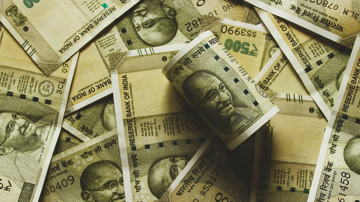 Rupee settles 4 paise lower at 83.50 against US dollar