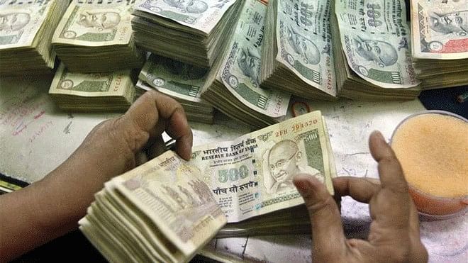 Rupee snaps two-day fall, recovers 6 paise against US dollar