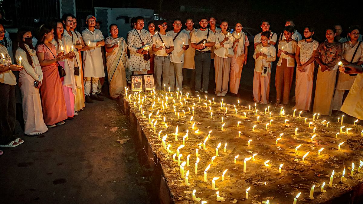 Women take part in a candlelight vigil against the "killing" of two missing students by unknown miscreants and demand peace in Manipur, Imphal, Wednesday, Sept. 27, 2023.
