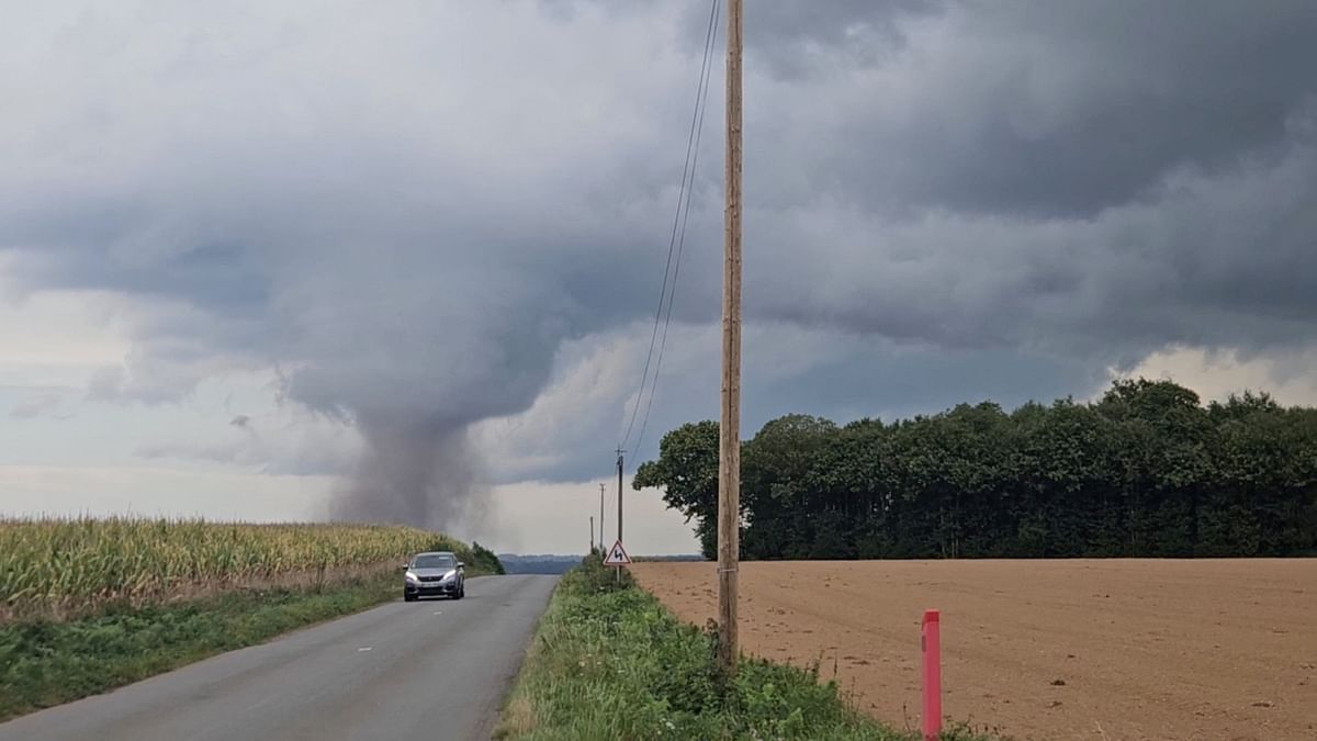 A view of a small tornado in Ernee, France, September 17, 2023 in this still image obtained from social media video.