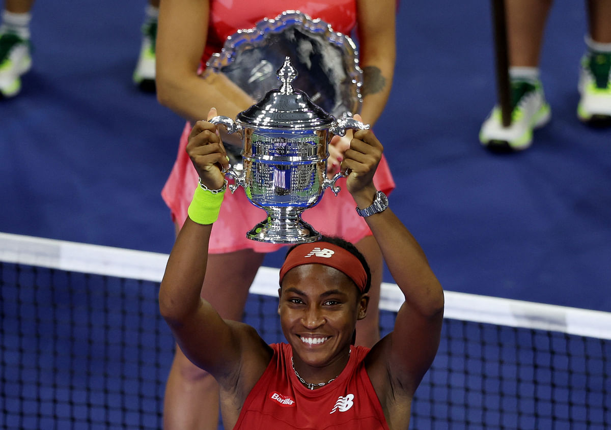 Coco Gauff of the US celebrates with the trophy after winning the US Open.