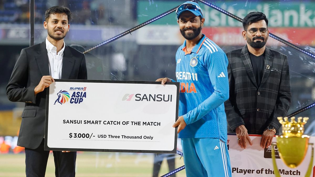 Ravindra Jadeja receives Sansui Catch of the match award during the presentation of the Final of the Asia Cup 2023.