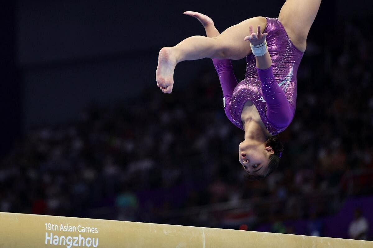 Japan's Ushioku Kohane in action on the balance beam during the women's artistic gymnastics subdivision 3 team final at the Asian Games. 
