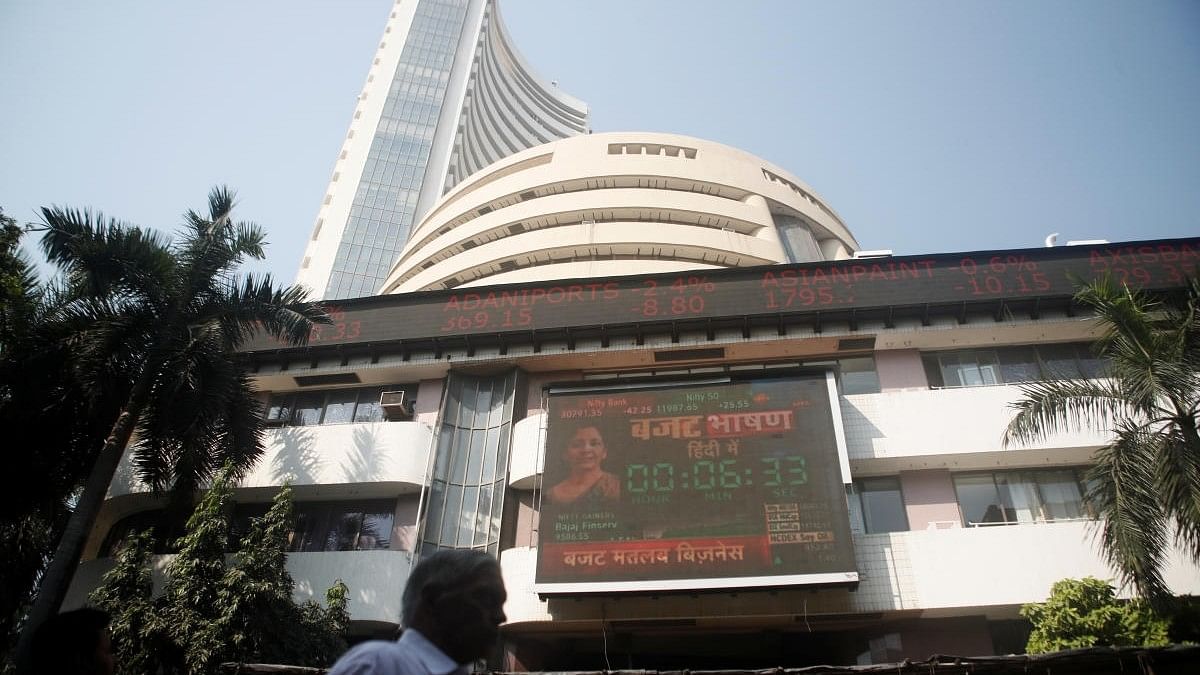 Sensex extends rally to 8th day; Nifty falls marginally after hitting record level