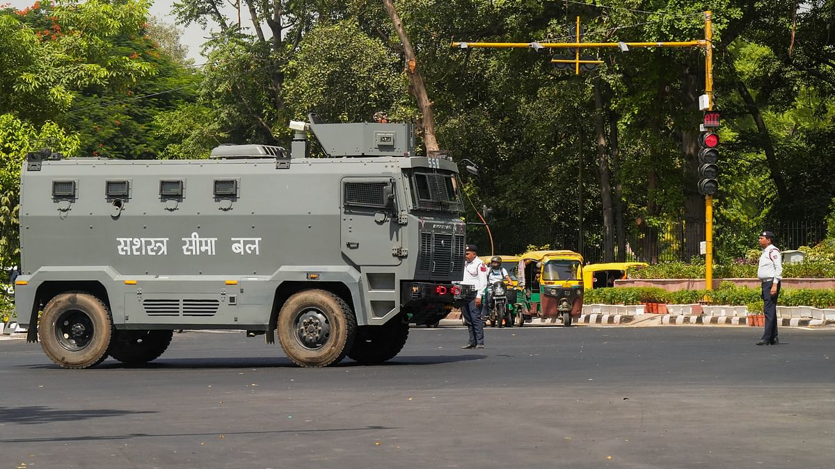A Sashastra Seema Bal (SSB) vehicle on patrol near the Rajghat ahead of the G20 Summit, in New Delhi.