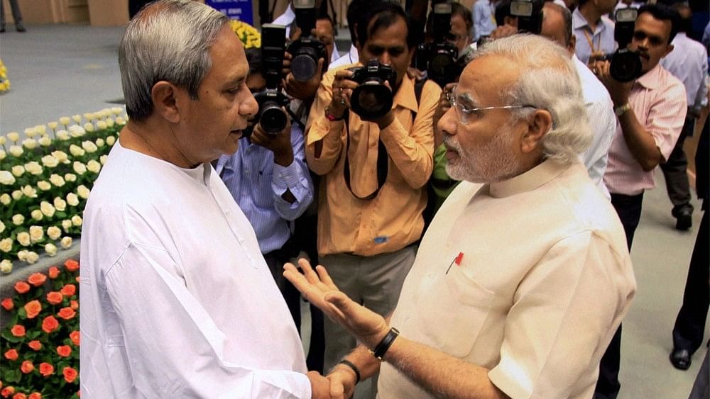 Patnaik rates Modi '8/10', Odisha BJP, Congress give BJD govt 'zero'