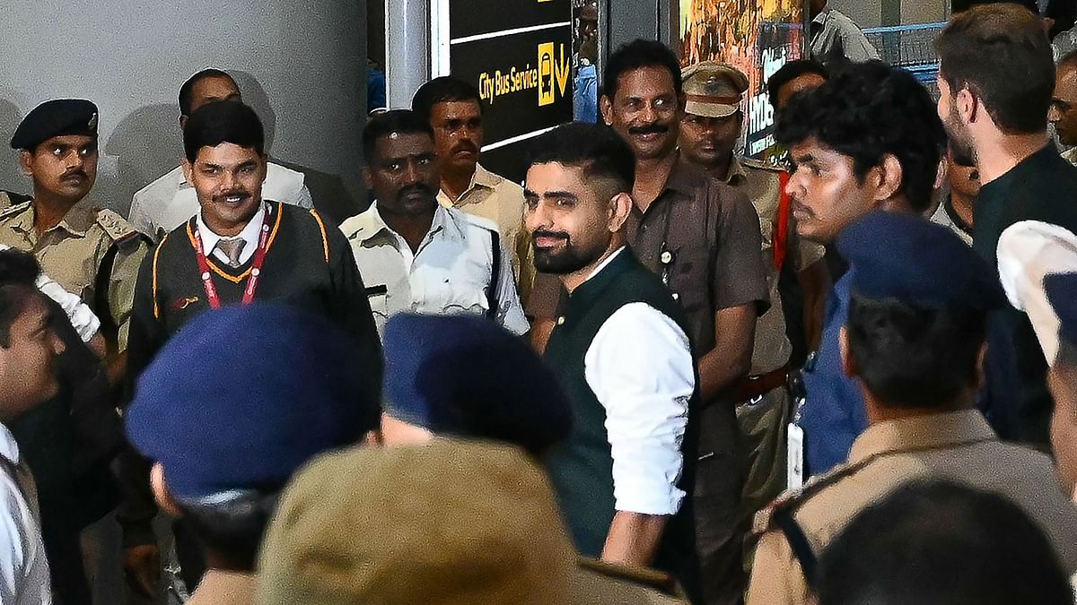 The team captain Babar Azam is seen addressing the crowd at the airport.