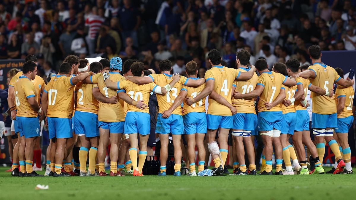 Uruguay's players huddle after the match against France.