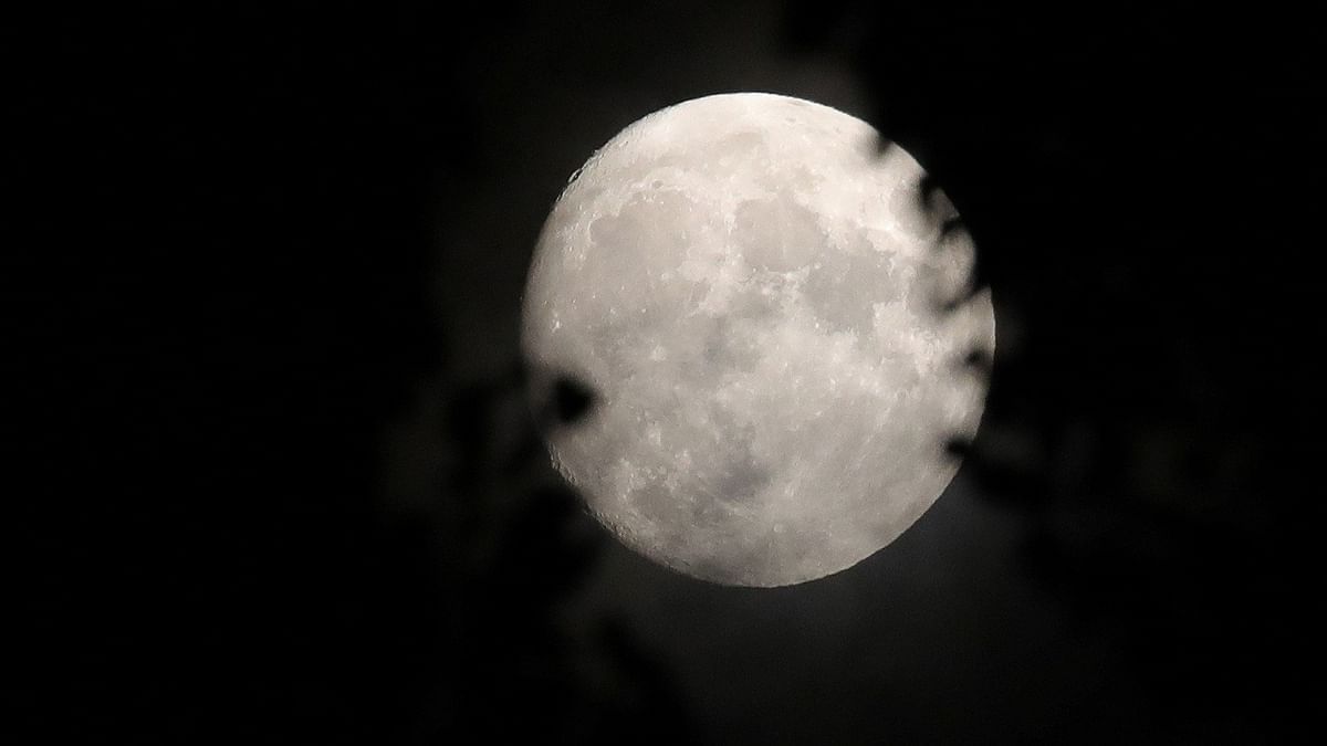 Almost full moon is seen over Tirana, days before reaching the full moon, Albania, September 27, 2023.