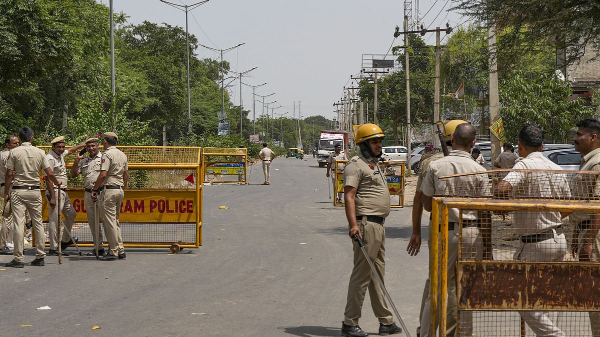 Police personnel at a check post ahead of a rally of Hindu organisations to be taken out in Nuh,.