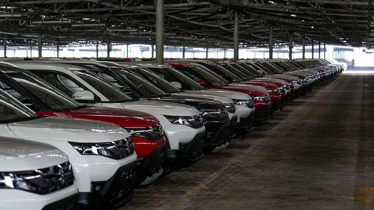 Cars park under a solar system-embedded shed at Maruti Suzuki Plant, at Manesar in Gurugram.