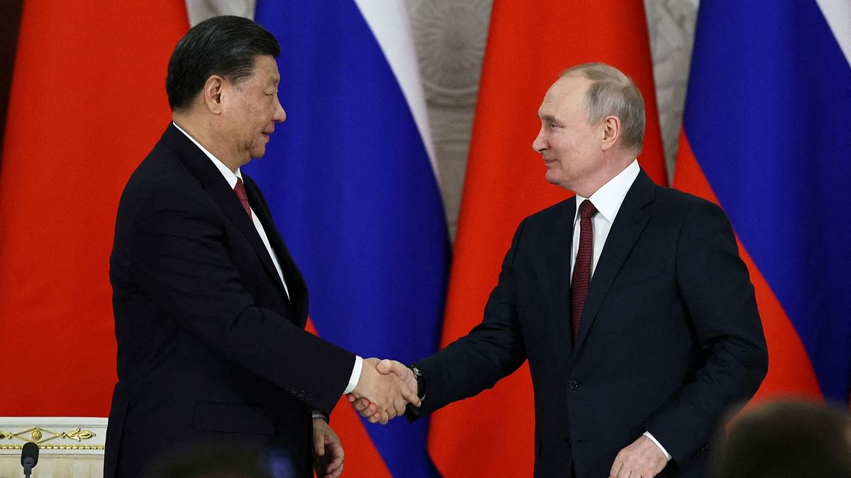 Putin visits 'dear friend' Xi in show of no-limits partnership