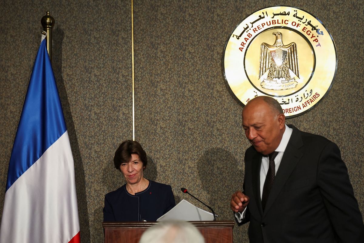 Minister for Europe and Foreign Affairs of France, Catherine Colonna and Egyptian Foreign Minister Sameh Shoukry leave after a news conference, amid the ongoing conflict between Israel and the Palestinian Islamist group Hamas, at the headquarters of Egyptian Ministry of Foreign Affairs, in Cairo, Egypt, October 16, 2023. 