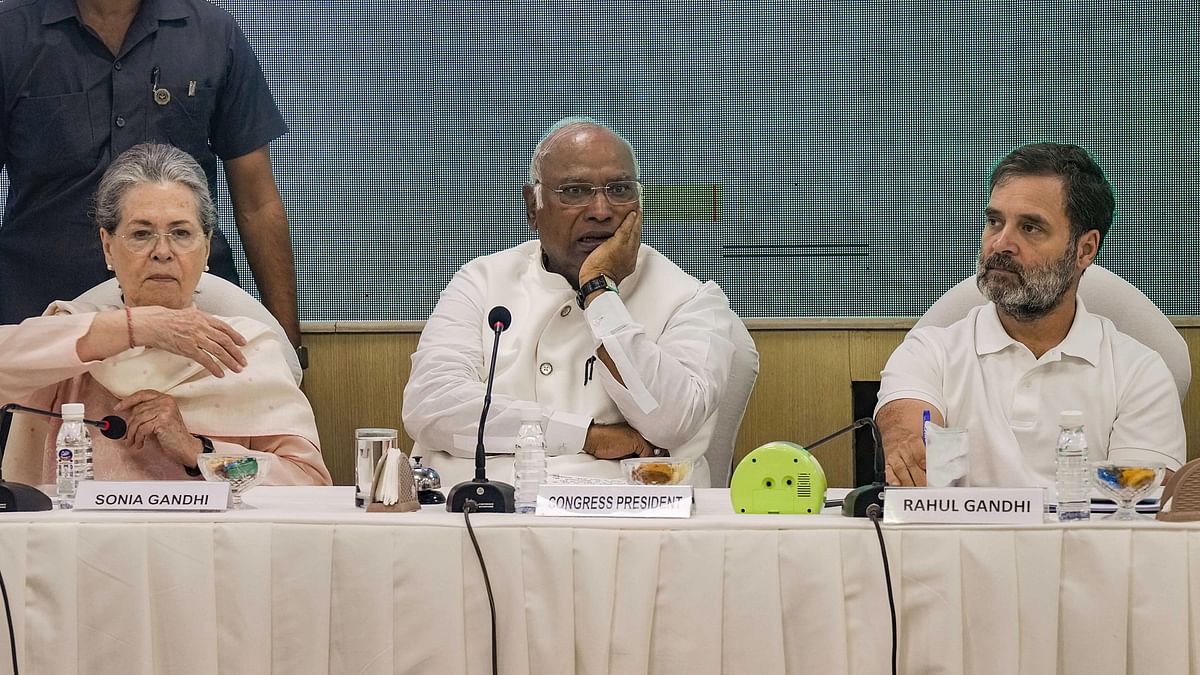 Congress President Mallikarjun Kharge with party leaders Sonia Gandhi and Rahul Gandhi during the Congress Working Committee meeting at the AICC Headquarters, in New Delhi.