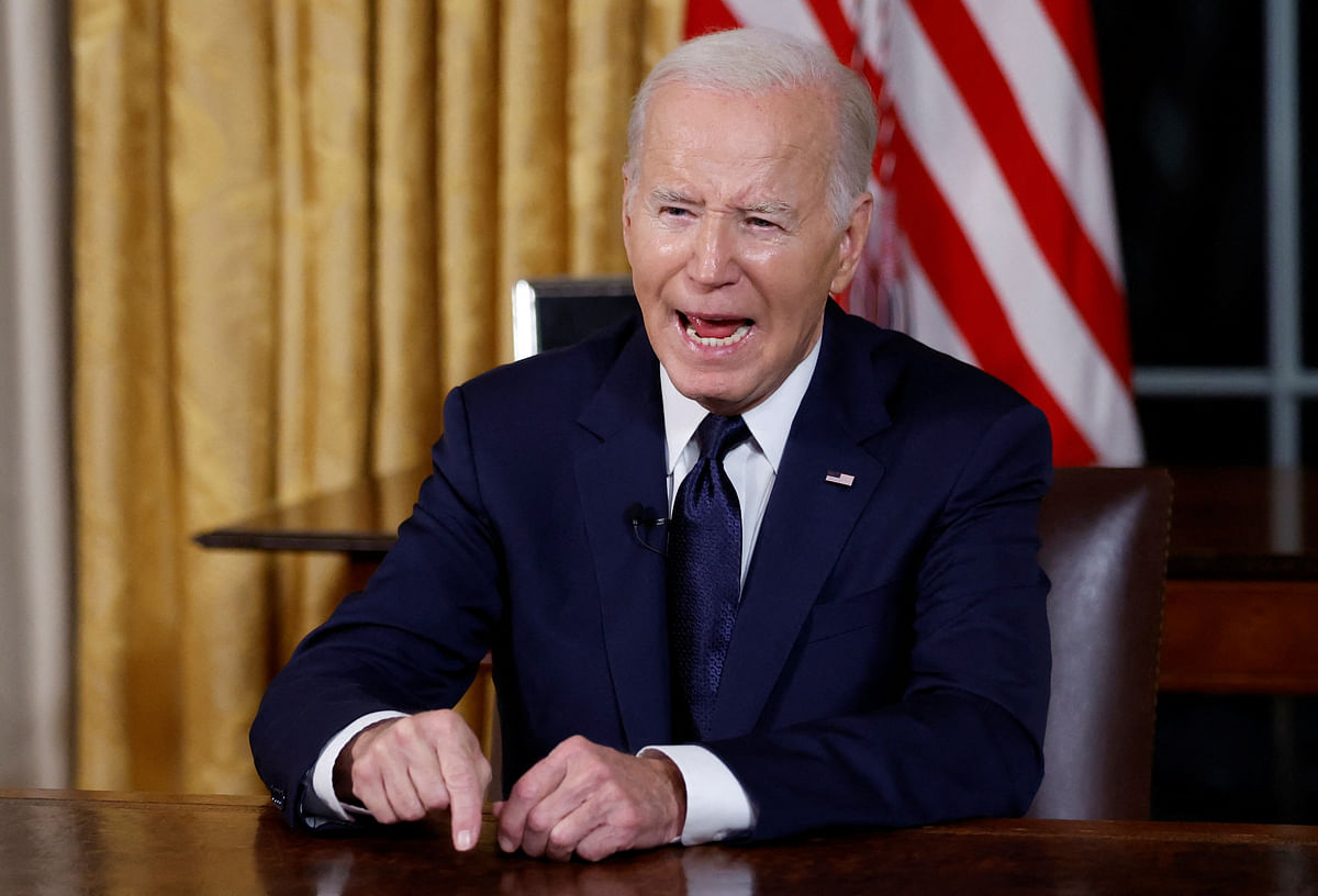 US President Joe Biden delivers a prime-time address to the nation about his approaches to the conflict between Israel and Hamas, humanitarian assistance in Gaza and continued support for Ukraine in their war with Russia, from the Oval Office of the White House in Washington, US, October 19, 2023.