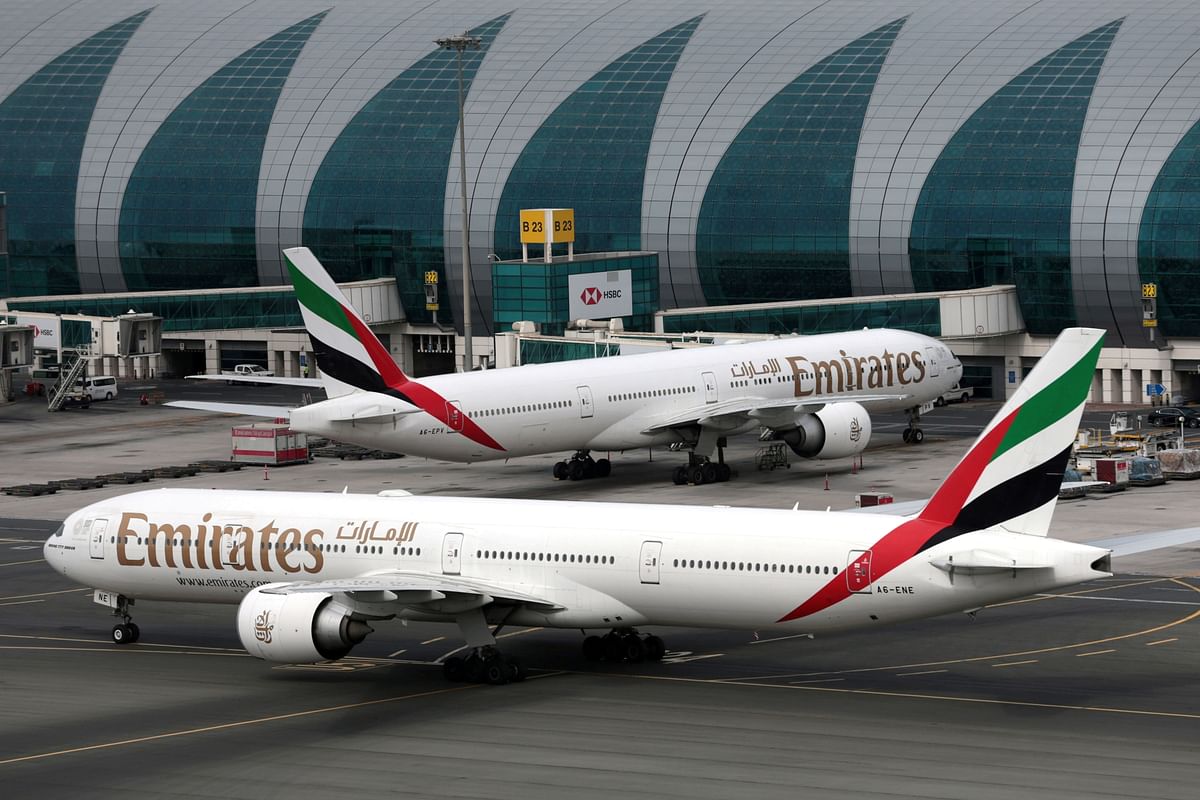 Emirates Airline Boeing 777-300ER planes are seen at Dubai International Airport in Dubai.