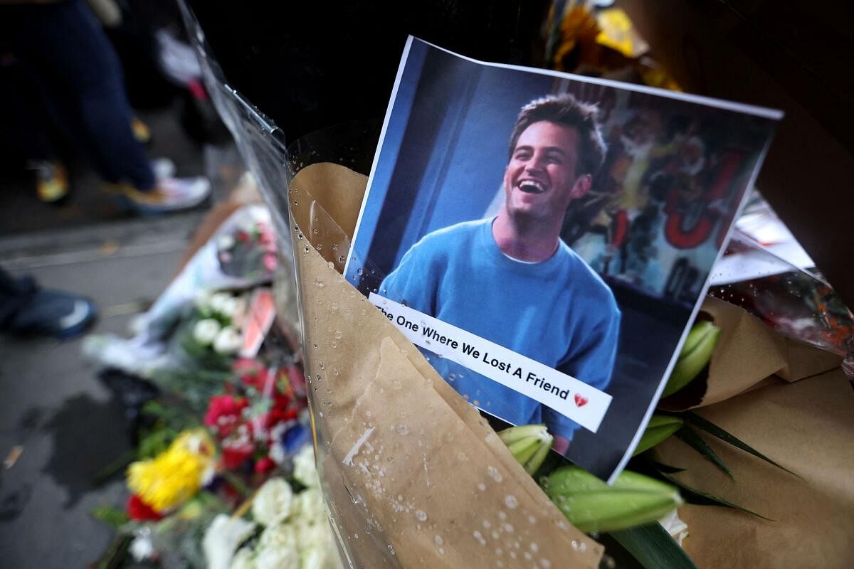 A makeshift memorial for 'Friends' actor Matthew Perry, who passed away on October 28, is pictured on Bedford Street in Manhattan in New York City. 