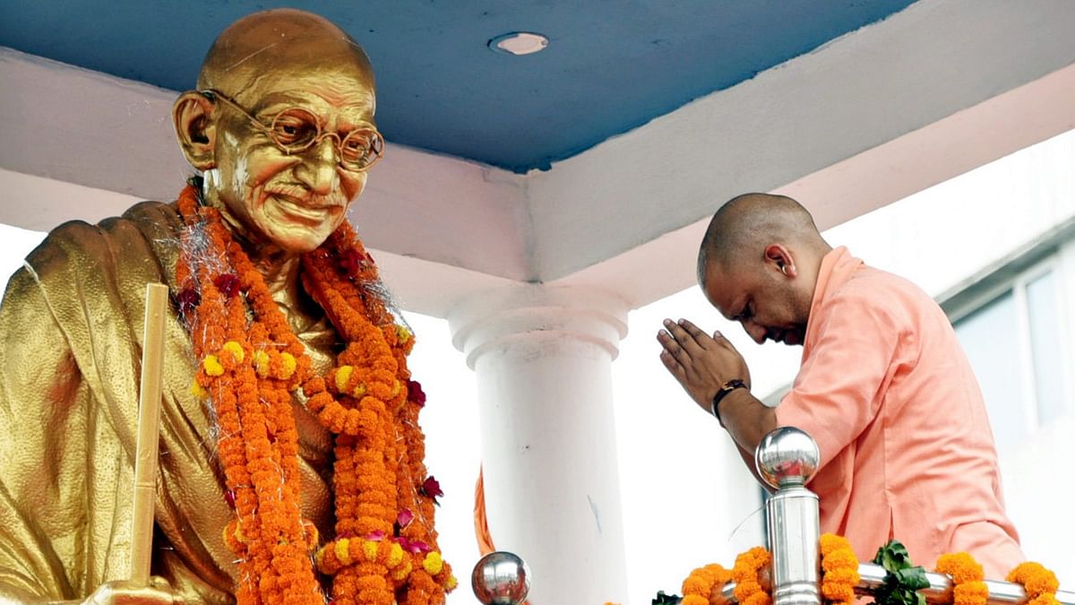 Uttar Pradesh Chief Minister Yogi Adityanath pays tribute to Mahatma Gandhi on his birth anniversary, in Gorakhpur.