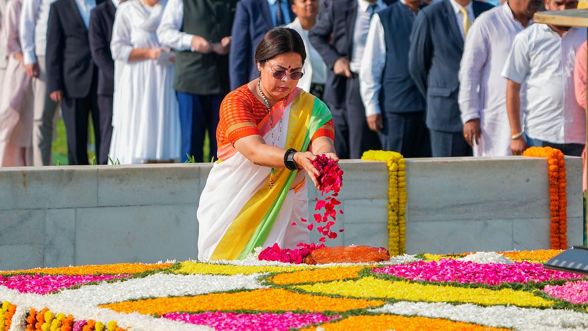 Union Minister of State Meenakshi Lekhi pays homage to Mahatma Gandhi on the occasion of his birth anniversary, at Rajghat in New Delhi.