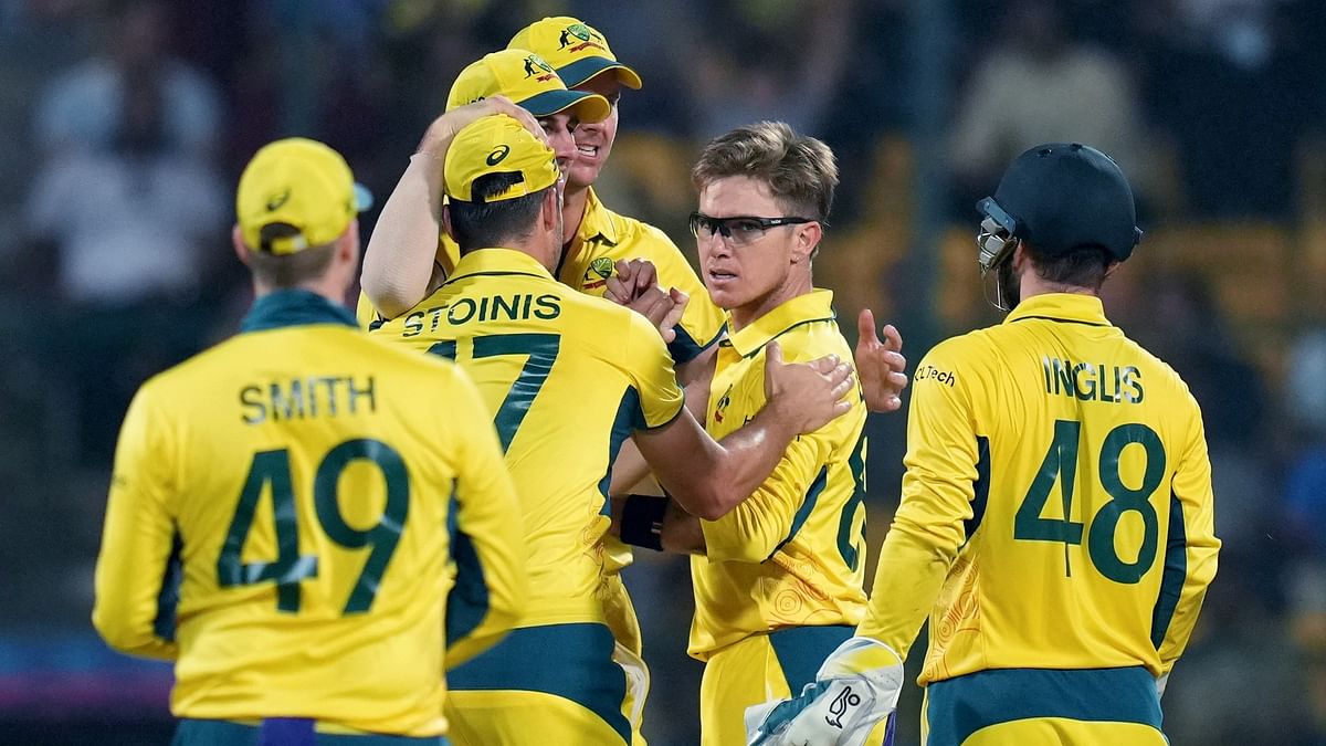 Australia's Adam Zampa celebrates with teammates after a successful appeal for the LBW of Pakistan's Mohammad Rizwan during the ICC Men's Cricket World Cup 2023 match between Pakistan and Australia at M. Chinnaswamy Stadium, in Bengaluru, Friday, Oct. 20, 2023.