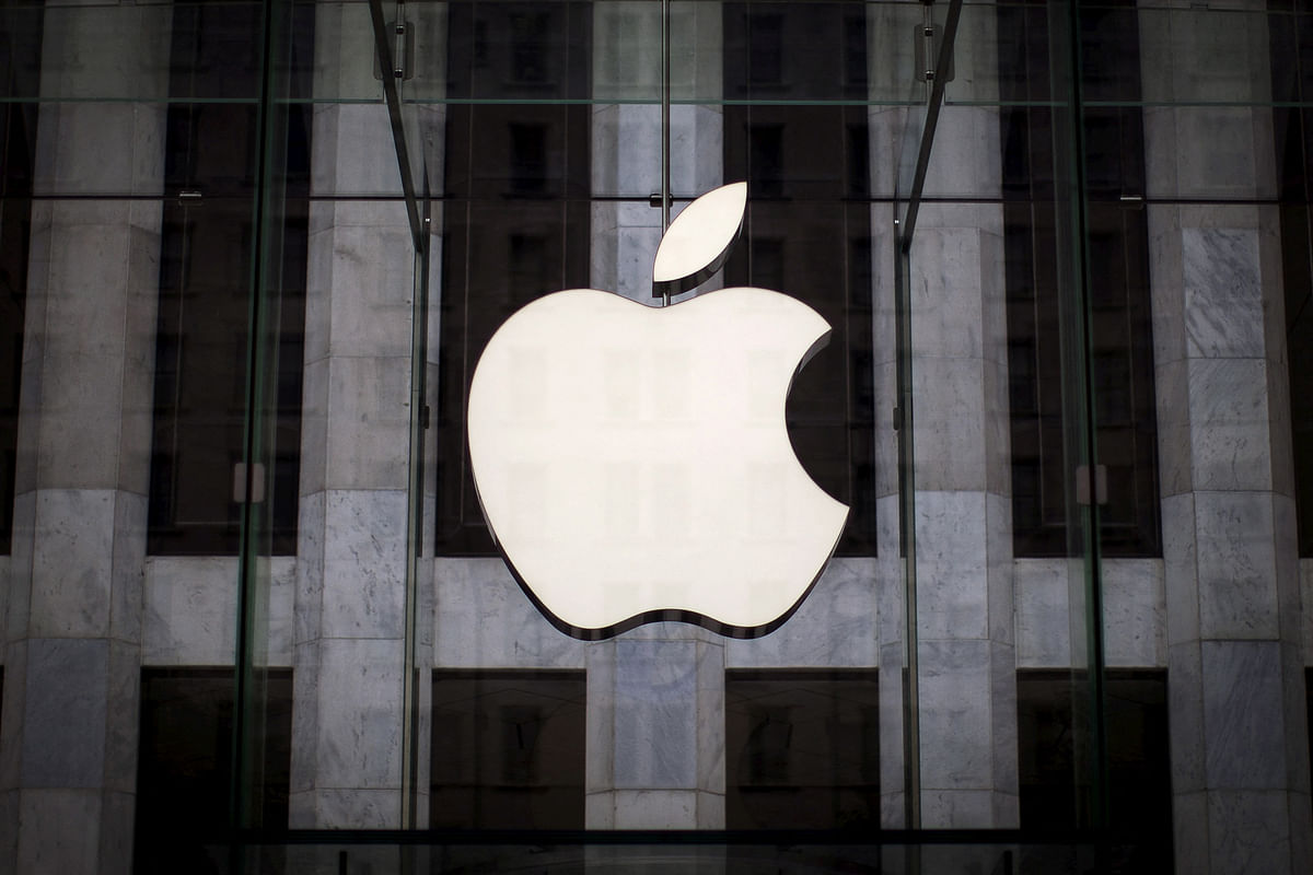 FILE PHOTO: An Apple logo hangs above the entrance to the Apple store on 5th Avenue in the Manhattan borough of New York City July 21 2015. REUTERS/Mike Segar/File Photo