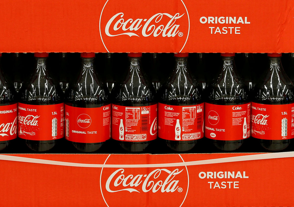 FILE PHOTO: Coca-Cola bottles 
