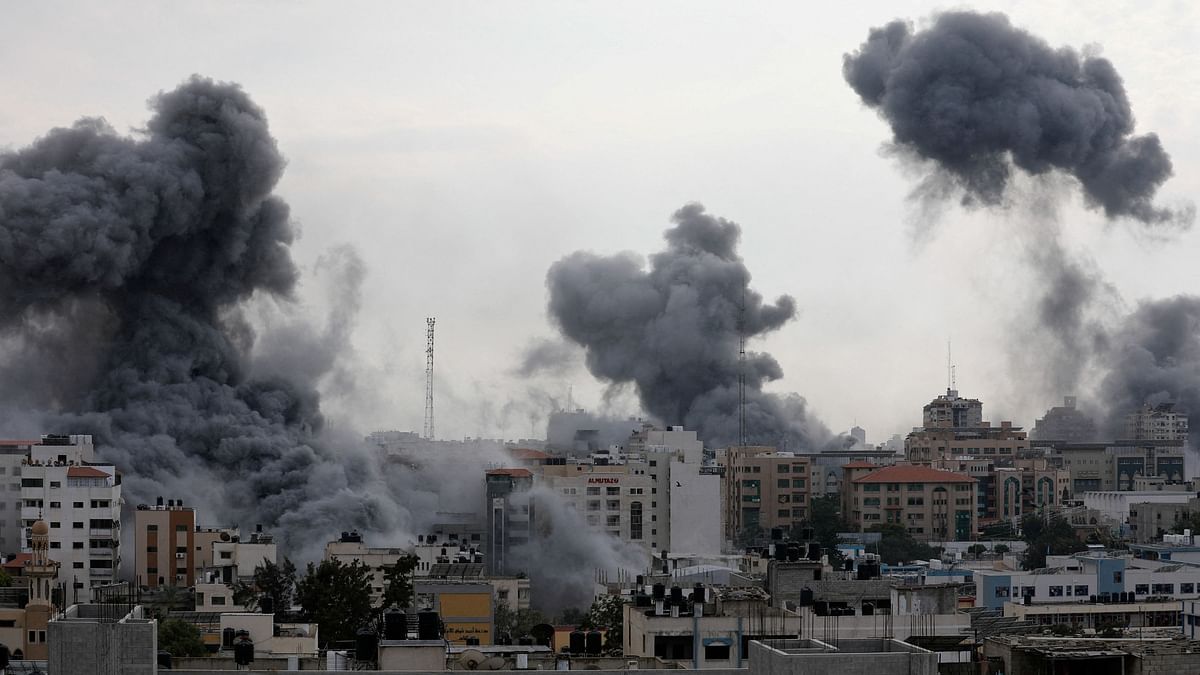 Smoke rises following Israeli strikes in Gaza, October 9, 2023.