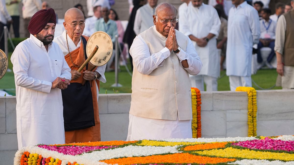 Congress President Mallikarjun Kharge pays homage to Mahatma Gandhi on the occasion of his birth anniversary, at Rajghat in New Delhi.