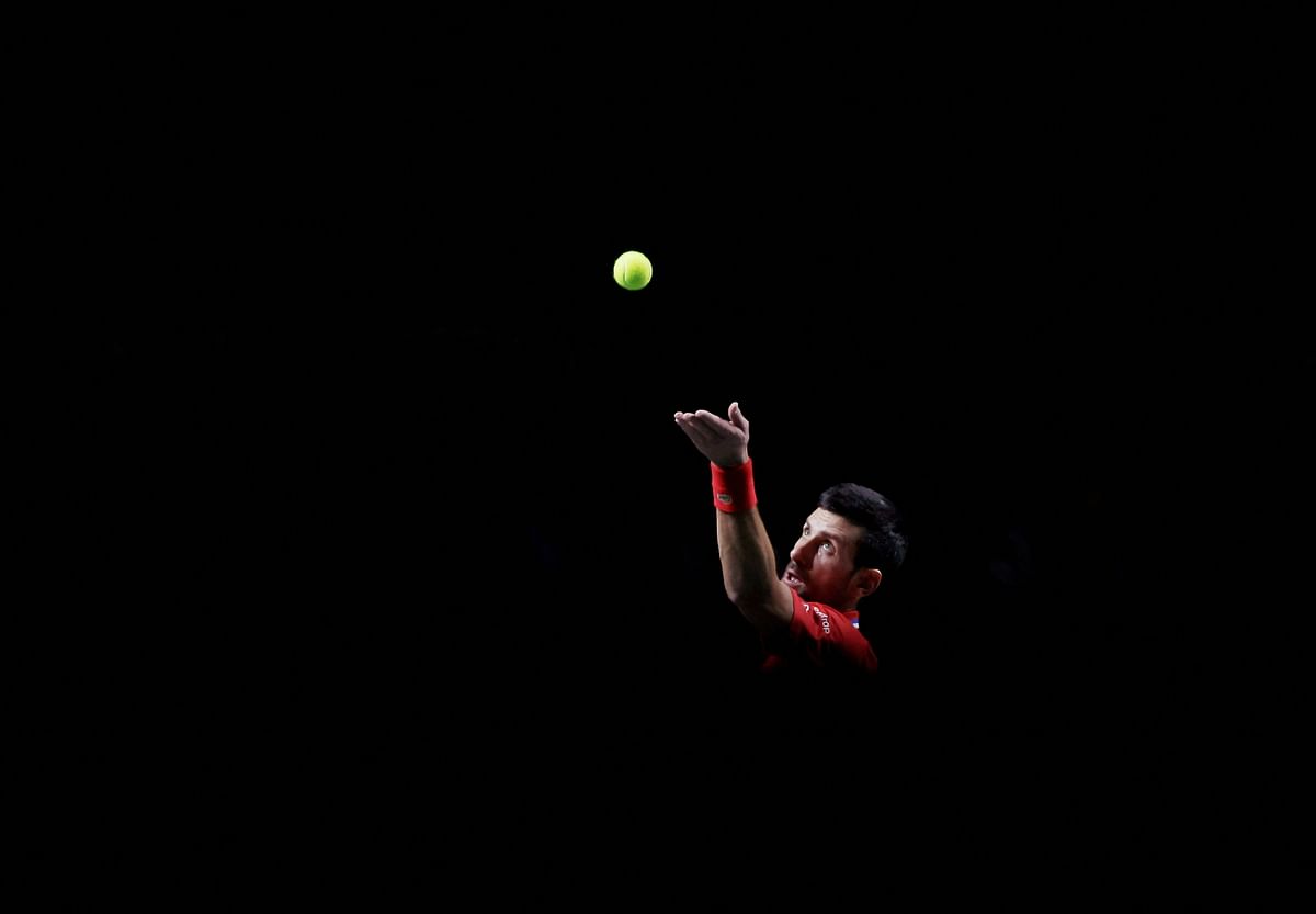 Tennis - Davis Cup - Finals - Serbia v Britain - Palacio de deportes Martin Carpena, Malaga, Spain - November 23, 2023 Serbia's Novak Djokovic in action during his match in the quarter final against Britain's Cameron Norrie 