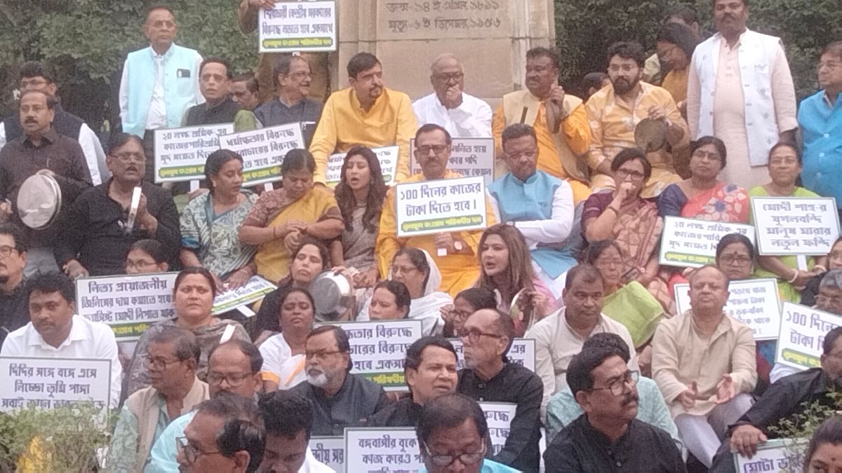 TMC leaders including minister Firhad Hakim protest against BJp at the Centre outside Bengal Assembly.