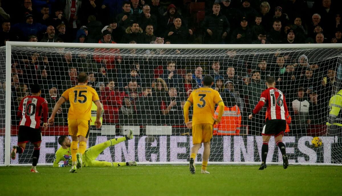 Oliver Norwood scores a second against Wolves.