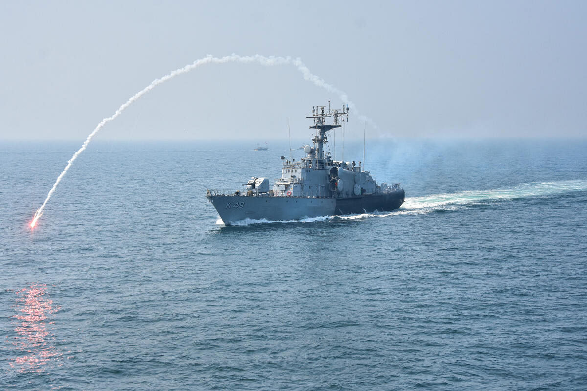 INS Vipul participates in a demonstration during the 'Day at Sea' event by the Indian Navy on the Arabian Sea in Mumbai.