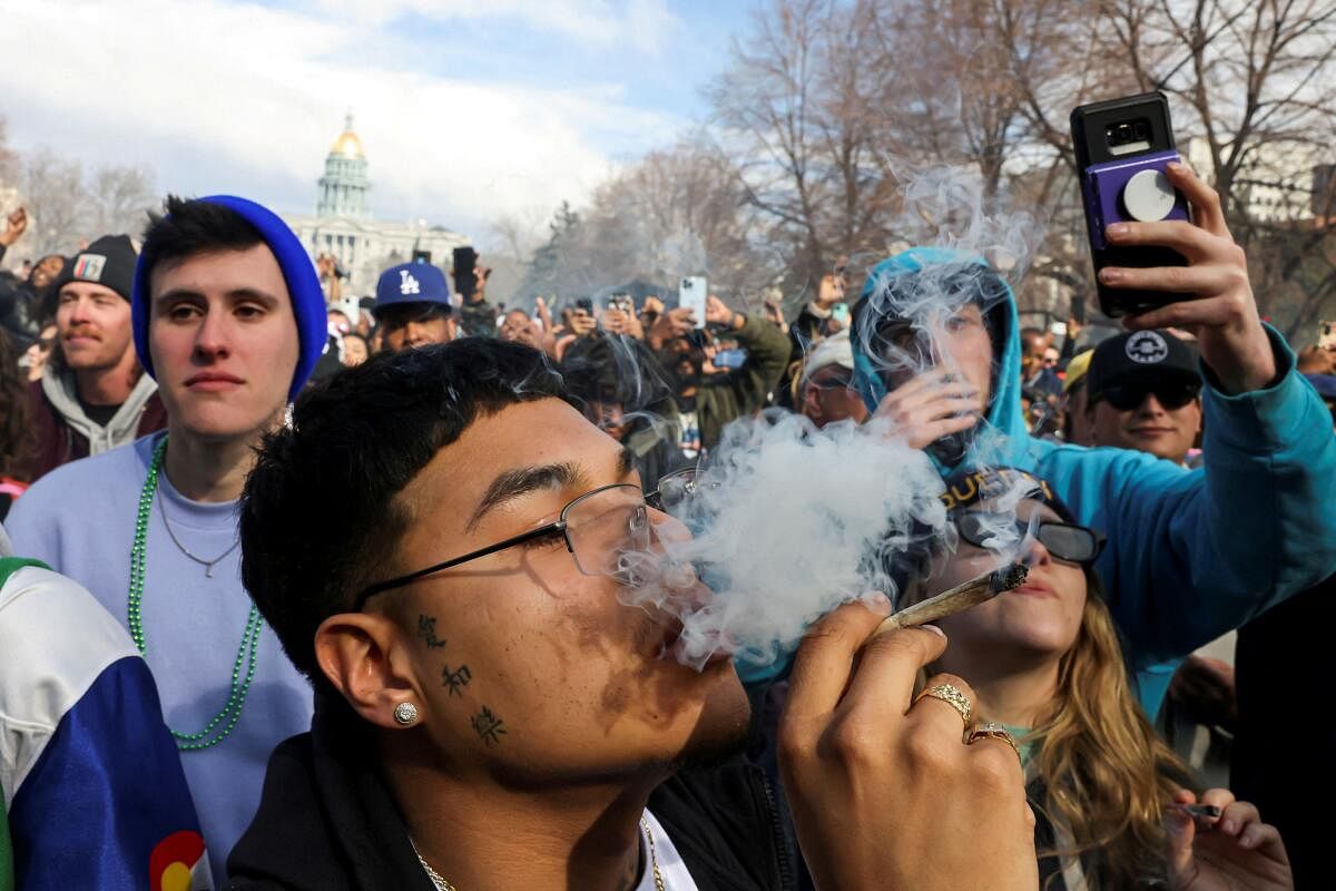 A man smokes cannabis during the informal annual cannabis holiday in Denver in US.