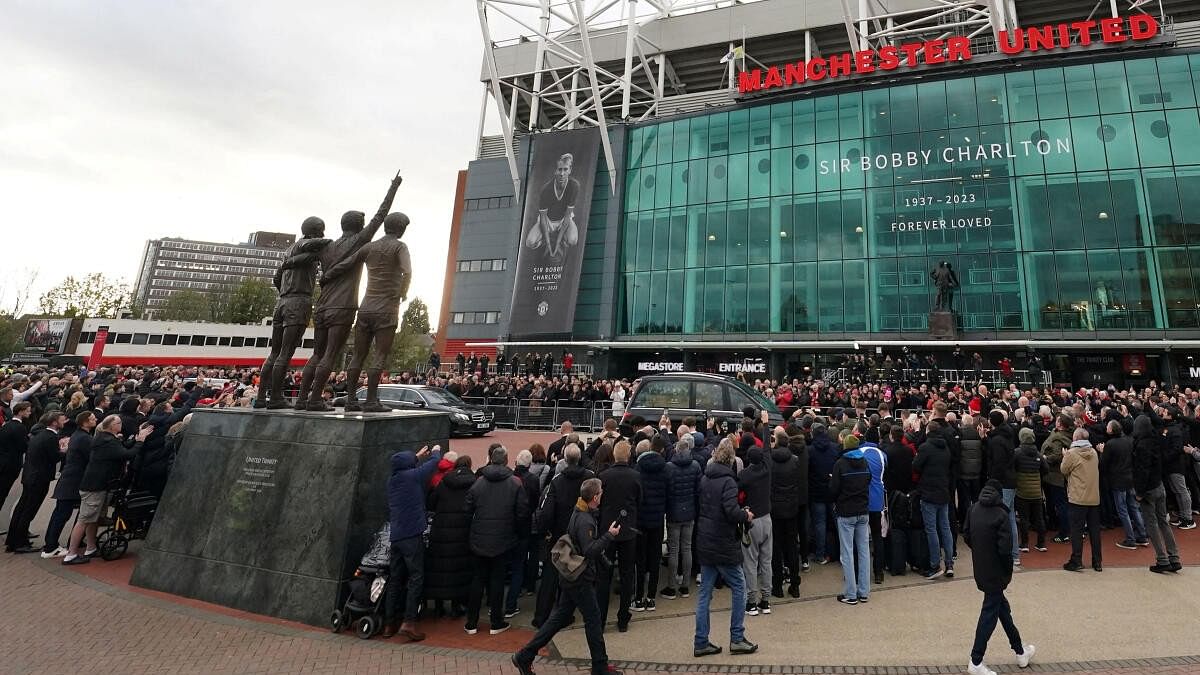 Thousands of fans welcome Charlton funeral cortege at Old Trafford