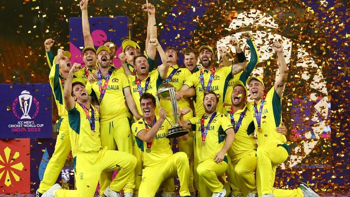ICC Cricket World Cup 2023 - Final - India v Australia - Narendra Modi Stadium, Ahmedabad, India - November 19, 2023 Australia players celebrate with the trophy after winning the ICC Cricket World Cup.