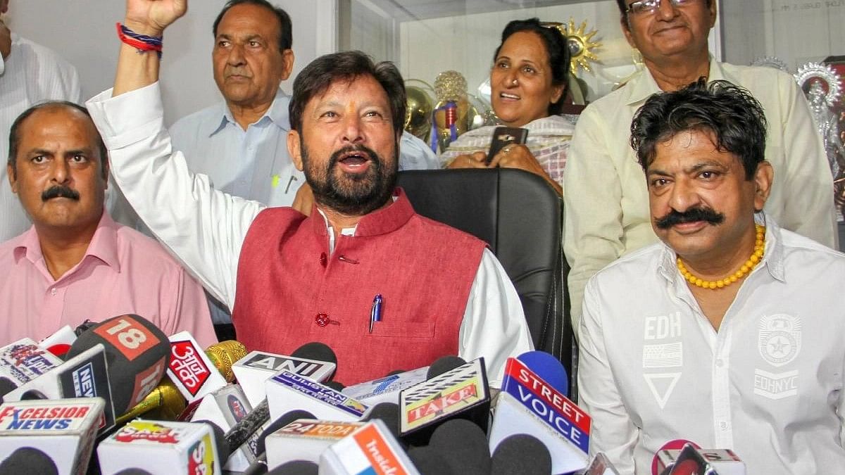 Former minister Lal Singh appears before ED in Jammu; supporters stage protest