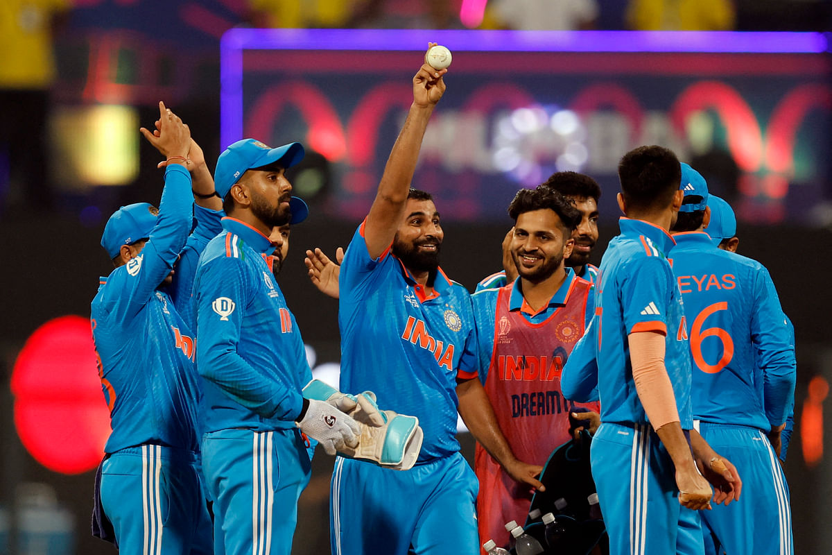 India's Mohammed Shami celebrates his five-wicket-haul after taking the wicket of Sri Lanka's Kasun Rajitha, caught by Shubman Gill at the Wankhede Stadium, Mumbai. 