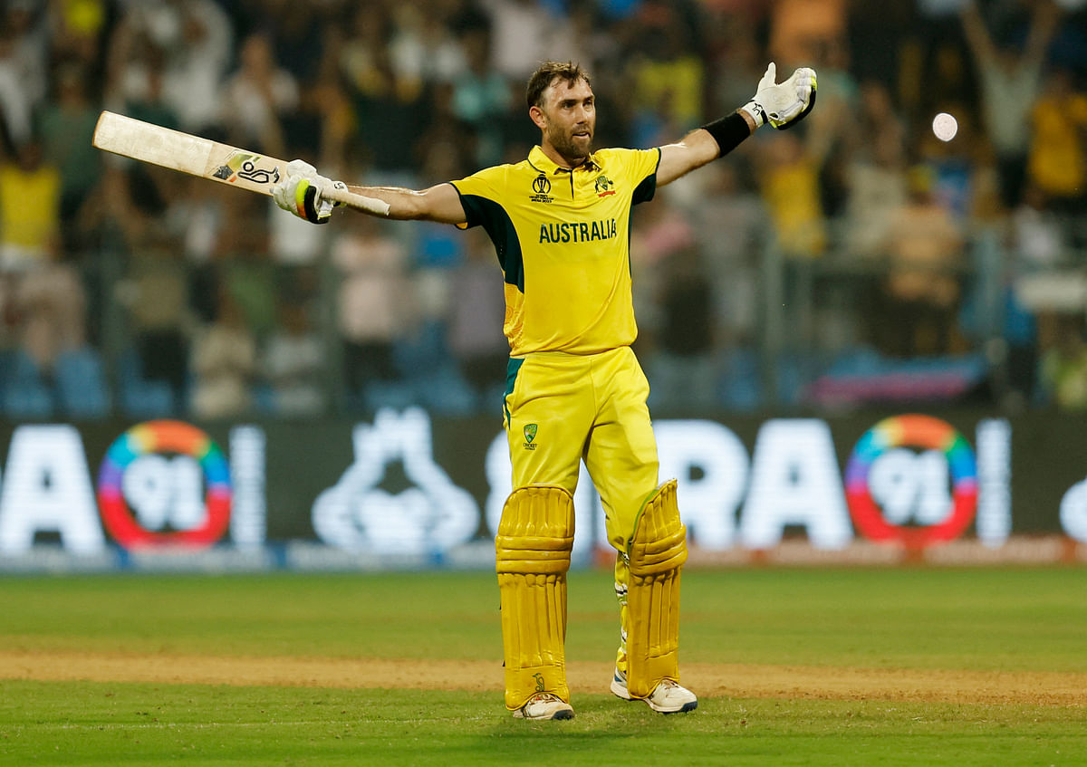  Australia's Glenn Maxwell celebrates after the match at the Wankhede Stadium, Mumbai. 