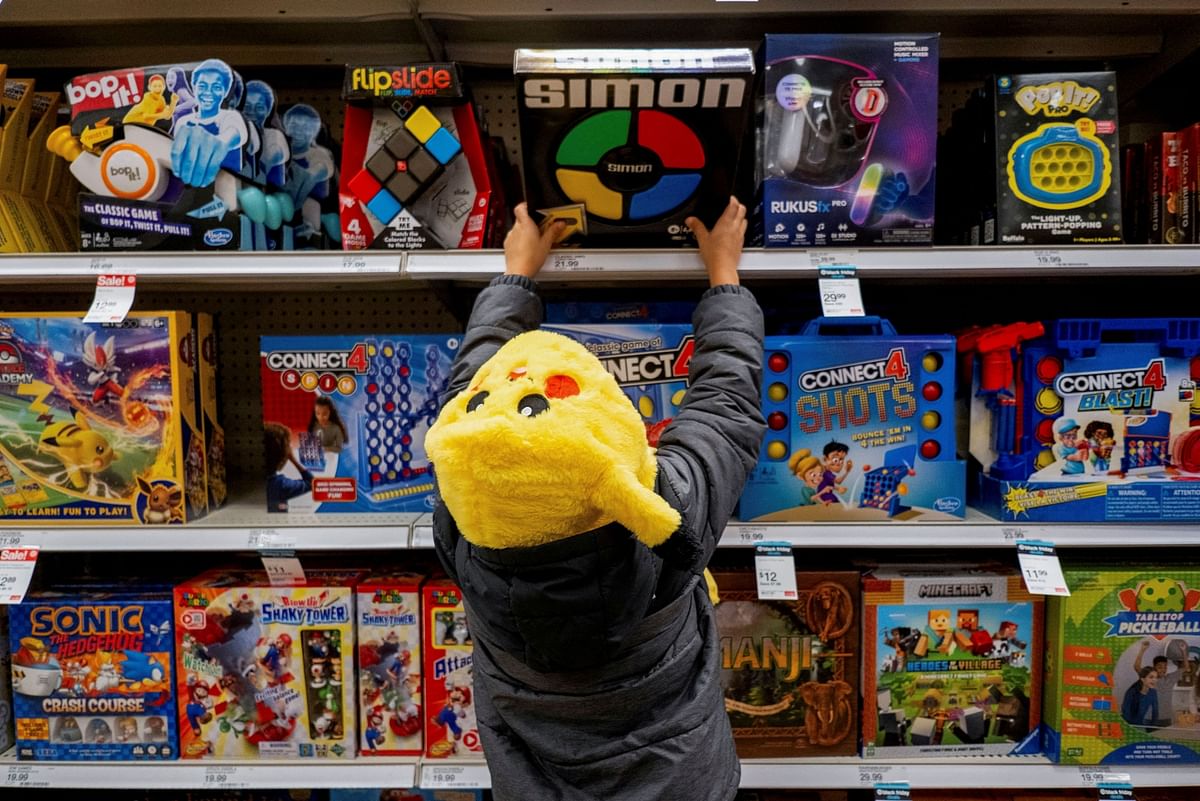 A child looks at toys in a Target store ahead of the Thanksgiving holiday and traditional Black Friday sales in Chicago, Illinois, U.S. November 21, 2023.