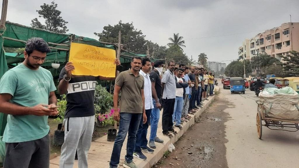 Human chain of hope: Over 1,000 Bengaluru citizens protest incomplete road work  