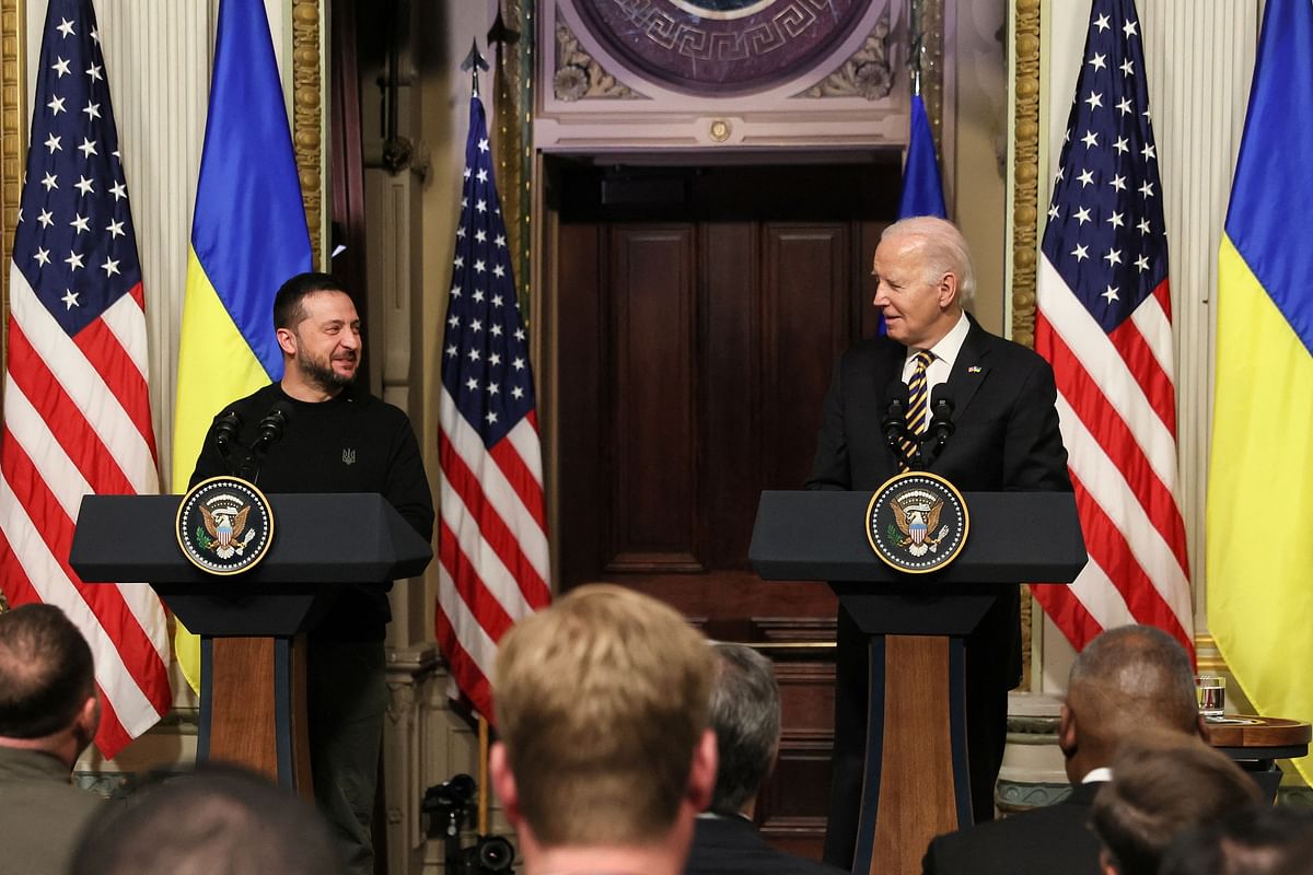 U.S. President Joe Biden and Ukraine's President Volodymyr Zelenskiy react during a joint press conference at the White House in Washington.