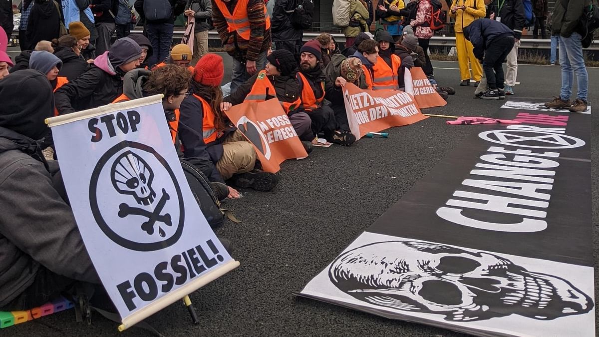 Climate activists block Amsterdam highway in protest against ING
