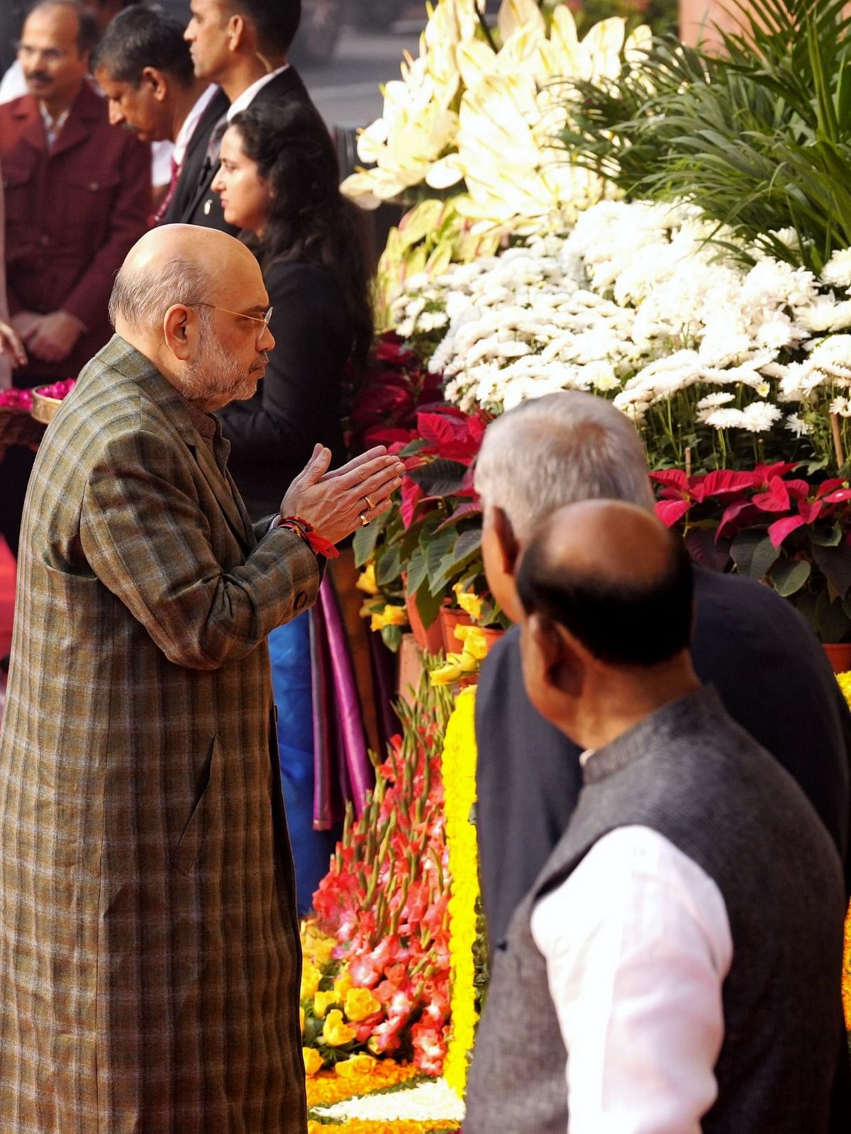 Union Home Minister Amit Shah is seen paying floral tribute to the 2001 Parliament attack martyrs.