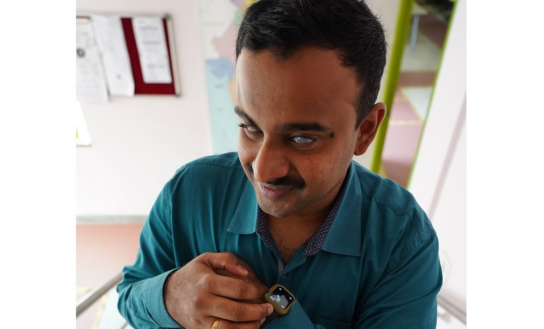 Moses Chowdari Gorrepati using Voice Assistant Siri to perform action on Apple Watch.